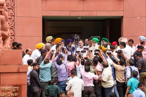 PTI : Leader of Opposition in Lok Sabha and Congress MP Rahul Gandhi along with farmer leaders speaks to the media during the Monsoon session of the Parliament